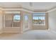 Bedroom featuring multiple windows that offer water views and plenty of natural light at 6414 Sunset Bay Cir, Apollo Beach, FL 33572