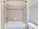 Shower with tiled walls, offering a clean and functional bathing space at 6414 Sunset Bay Cir, Apollo Beach, FL 33572