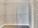Walk-in closet featuring carpet flooring, wire shelving, and ample storage space at 6414 Sunset Bay Cir, Apollo Beach, FL 33572