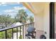 Comfortable balcony with grill and a view of neighborhood at 7540 Sunshine Skyway S Ln # 217, St Petersburg, FL 33711
