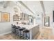 Well-lit kitchen with a large island, bar seating, and modern decor at 7540 Sunshine Skyway S Ln # 217, St Petersburg, FL 33711