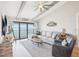 Coastal living room with water views, comfortable seating, and stylish decor at 7540 Sunshine Skyway S Ln # 217, St Petersburg, FL 33711