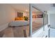 Modern loft space with a comfortable bed and stylish railing at 7540 Sunshine Skyway S Ln # 217, St Petersburg, FL 33711