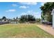 Spacious backyard with lush lawn and waterfront view, perfect for outdoor activities and relaxation at 8702 Driftwood Dr, Tampa, FL 33615