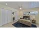 Bedroom with a light wood frame bed, closet and a ceiling fan at 8702 Driftwood Dr, Tampa, FL 33615