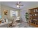 Bedroom with built-in closet space, ceiling fan, modern style decor at 8702 Driftwood Dr, Tampa, FL 33615