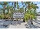 Bay Crest Park community boat ramp sign surrounded by palms at 8702 Driftwood Dr, Tampa, FL 33615