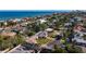 Aerial view of a quaint neighborhood near the ocean and Tampa, Florida at 920 Palm Dr, Belleair Beach, FL 33786