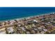 Overhead shot of Tampa neighborhood with beachfront access at 920 Palm Dr, Belleair Beach, FL 33786