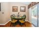 Cozy dining area with a table for four and sliding glass doors to the outside at 9229 Dayflower Dr, Tampa, FL 33647