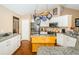 Well-equipped kitchen featuring a central island, stainless appliances, and modern finishes at 9229 Dayflower Dr, Tampa, FL 33647