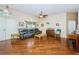 Spacious living room boasting hardwood floors and comfortable seating at 9229 Dayflower Dr, Tampa, FL 33647