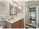 Bathroom featuring a tile floor, and vanity with storage space at 9945 47Th N Ave # 208, St Petersburg, FL 33708