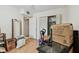 Bright bedroom with an open closet and laminate flooring, ready for personalization at 9945 47Th N Ave # 208, St Petersburg, FL 33708