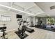 Community gym featuring cardio equipment and weights for a convenient workout space at 9945 47Th N Ave # 208, St Petersburg, FL 33708