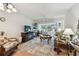 Spacious living room with large windows, providing lots of natural light and beautiful views at 9945 47Th N Ave # 208, St Petersburg, FL 33708