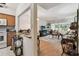 Bright living room flows into the kitchen, featuring lots of natural light at 9945 47Th N Ave # 208, St Petersburg, FL 33708