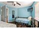 Blue bedroom with two beds at 11026 Austin Ct, New Port Richey, FL 34654