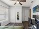 Bedroom featuring a large closet and desk at 11026 Austin Ct, New Port Richey, FL 34654