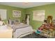 Cozy bedroom with natural light, ample closet space, and comfortable furnishings, offering a serene retreat at 12213 Floral Ln, Thonotosassa, FL 33592