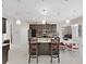 Large kitchen with a granite island, stainless steel appliances, and pendant lighting at 1312 Fishing Lake Dr, Odessa, FL 33556