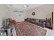 Bright living room features high ceilings, and a large rug at 1312 Fishing Lake Dr, Odessa, FL 33556