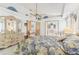 Spacious bedroom features natural light, ensuite bath, and stylish decor at 13553 Glaze Brook Dr, Hudson, FL 34667