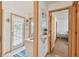 Entryway with natural lighting, views of multiple rooms, and access to the outdoors at 13553 Glaze Brook Dr, Hudson, FL 34667