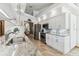 Bright kitchen with stainless appliances, granite countertops, and an open design at 13553 Glaze Brook Dr, Hudson, FL 34667