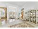 Bright living room featuring tall ceilings, natural light, and elegant decor at 13553 Glaze Brook Dr, Hudson, FL 34667