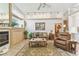 Bright and airy living room with fireplace and open layout at 13553 Glaze Brook Dr, Hudson, FL 34667