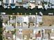 Overhead view of a waterfront neighborhood with canal access, pointing to the subject property at 13810 Malcolm Ave, Hudson, FL 34667
