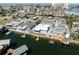 Aerial view of a house featuring a canal at 13810 Malcolm Ave, Hudson, FL 34667