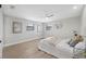 Bright bedroom with neutral tones, ceiling fan, and warm accents create a relaxing atmosphere at 13810 Malcolm Ave, Hudson, FL 34667