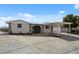 Charming single-story home with a stone entryway and a covered parking area at 13810 Malcolm Ave, Hudson, FL 34667
