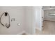 Functional laundry hook-ups in a clean, well-lit room, conveniently located near the main living area at 13810 Malcolm Ave, Hudson, FL 34667