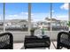 The lanai includes furniture and water views at 13810 Malcolm Ave, Hudson, FL 34667