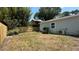 Spacious backyard with a new fence and mature trees at 1419 55Th S St, Gulfport, FL 33707