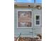 Close-up of an exterior mosaic, featuring a nude figure and landscape design at 1419 55Th S St, Gulfport, FL 33707