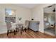 Cozy kitchen with an island and space for eat-in dining at 1419 55Th S St, Gulfport, FL 33707