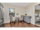 Eat-in kitchen with stainless steel refrigerator, and a charming breakfast nook for casual dining at 1419 55Th S St, Gulfport, FL 33707