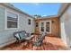 This charming patio features seating and natural light at 1419 55Th S St, Gulfport, FL 33707