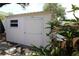 Exterior view of a garden shed providing storage space for outdoor tools and equipment at 1525 Albemarle Ct, Dunedin, FL 34698