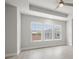 Bright bedroom with large windows and ceiling fan at 206 S Tampania Ave # 4, Tampa, FL 33609