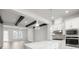 Bright kitchen with stainless steel appliances, large center island, and open layout at 206 S Tampania Ave # 4, Tampa, FL 33609