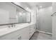 The main bathroom features a double sink vanity and glass shower enclosure at 206 S Tampania Ave # 4, Tampa, FL 33609