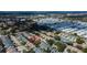 Aerial view shows home in a community with mature landscaping at 2547 Stony Brook Ln, Clearwater, FL 33761