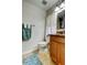 Well-lit bathroom with a toilet, granite countertop, and linen closet at 2547 Stony Brook Ln, Clearwater, FL 33761