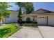 Beautifully maintained home exterior featuring lush landscaping and a well-kept lawn for added charm at 2547 Stony Brook Ln, Clearwater, FL 33761