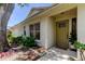 Welcoming front entrance with a stylish door, a 'Home Sweet Home' mat, and lovely potted plants at 2547 Stony Brook Ln, Clearwater, FL 33761